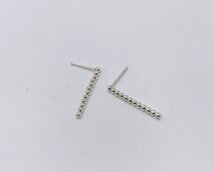 grotere staafjes met bolletjes