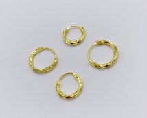 gedraaide vergulde creolen