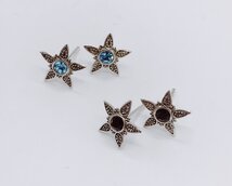 sterren met steentje in donker zilver sterren met steentje in donker zilver