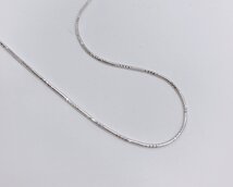 snake ketting met gegraveerde stukjes tussen