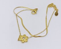 dubbel armbandje met een bloem